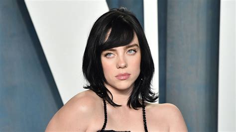 Billie Eilish stuns in a graphic string bikini in sun